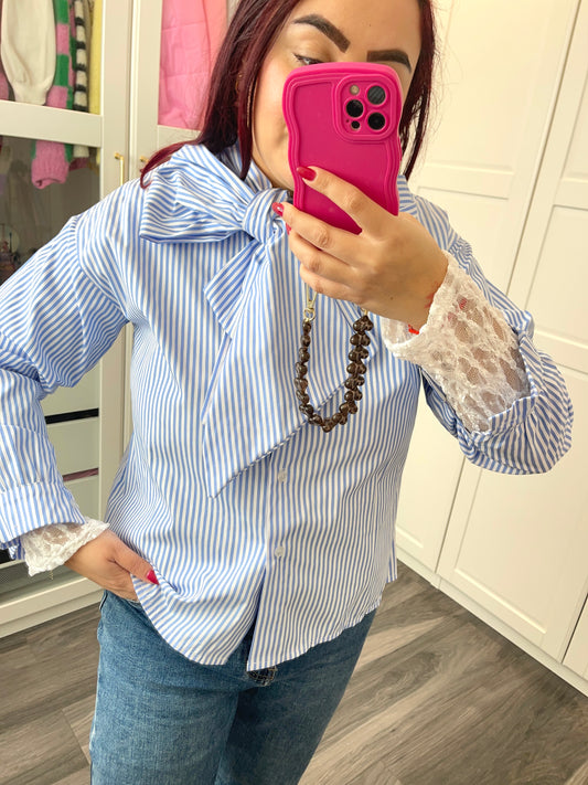 Gestreepte blouse met oversized strik blauw